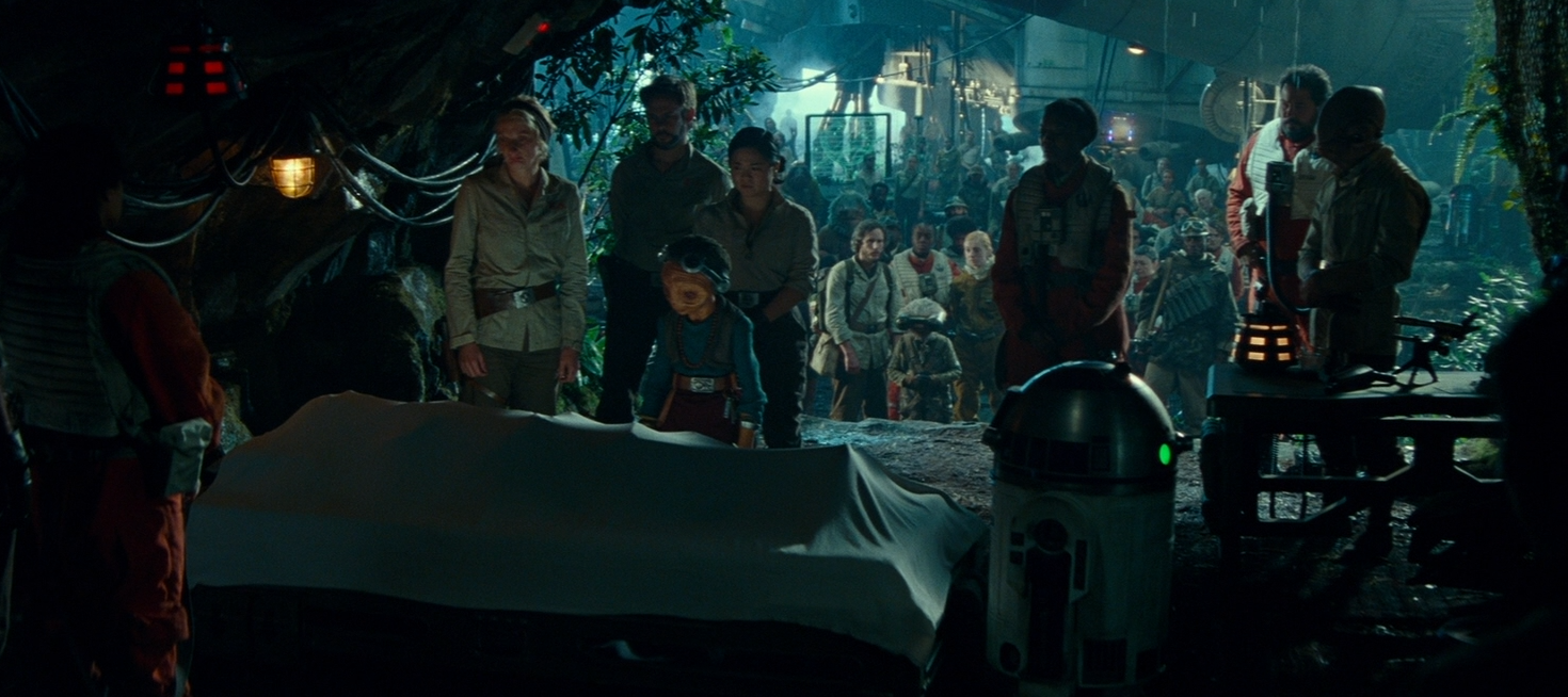 R2-SHP (far right) mourned the loss of General Organa.