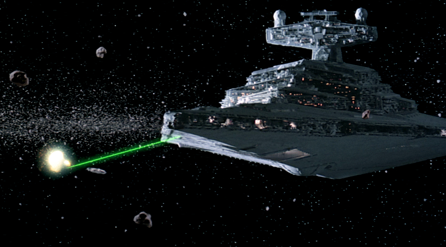 The Star Destroyer Avenger chases the Millennium Falcon out of the asteroid field.