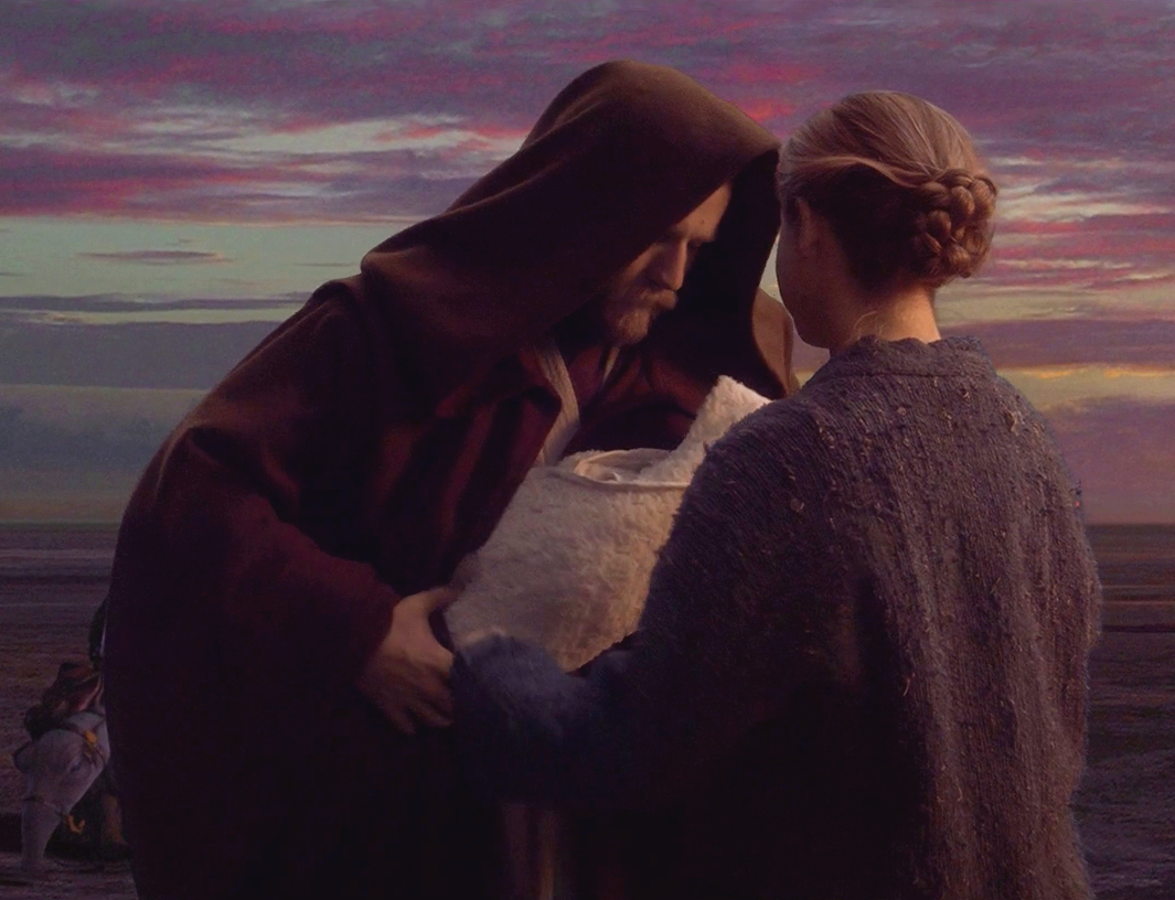 Kenobi giving Luke to Beru Lars.