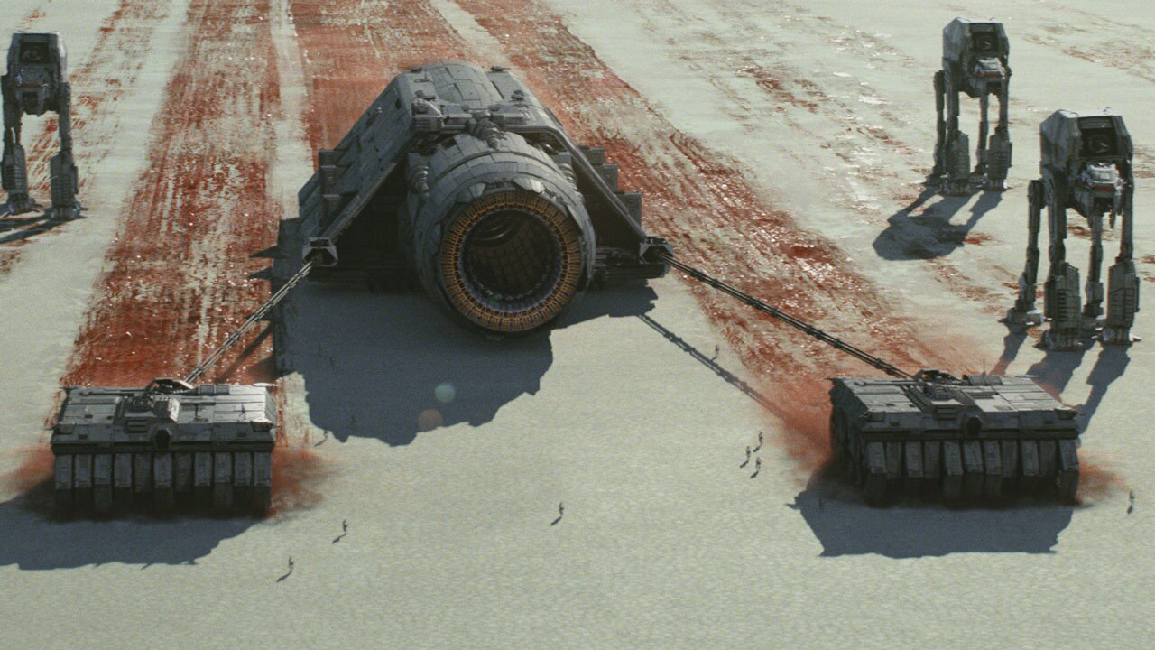 AT-HHs pulling the super siege cannon over the surface of Crait