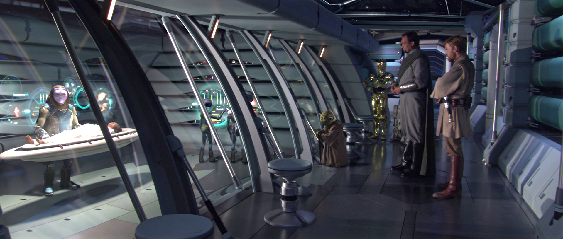 Organa, Yoda, and Kenobi watch as Amidala is tended to by medical droids.