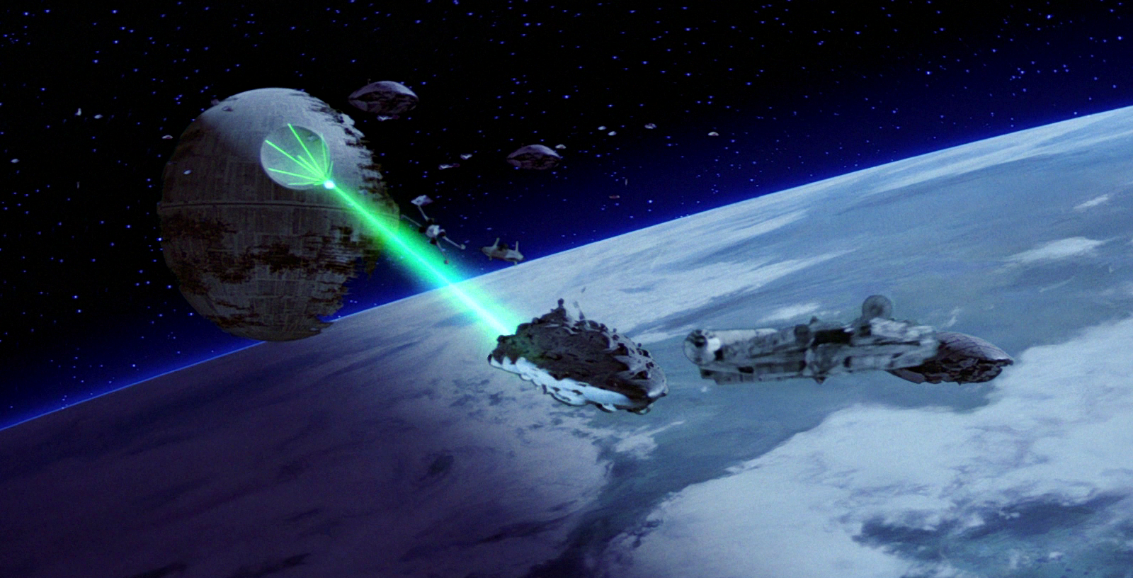 The Death Star II firing its superlaser at a Mon Calamari Star Cruiser over Endor.