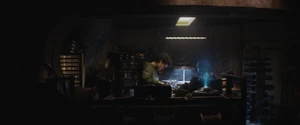 Wilmon constructs an explosive in his father's shop.