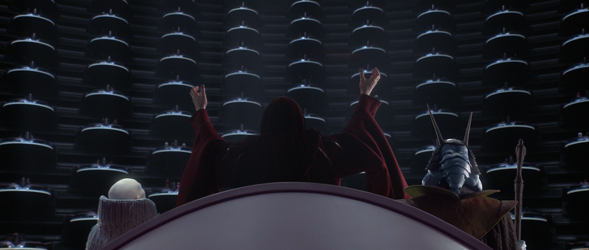 Supreme Chancellor Palpatine transforms the Republic into the first Galactic Empire before the ovational Senate.