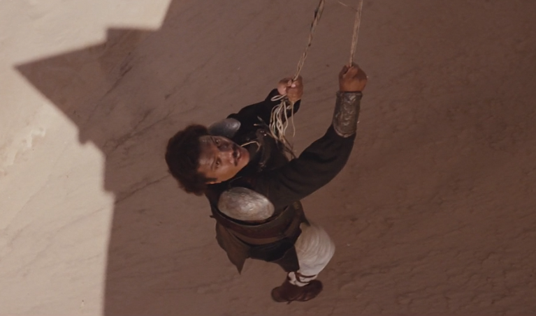 Calrissian hanging over the sarlacc pit in fear.