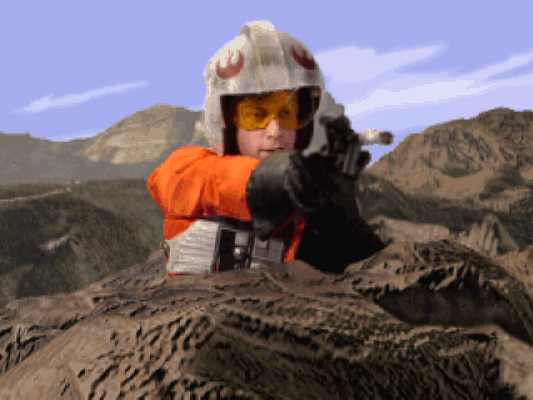 Rookie One firing a blaster pistol