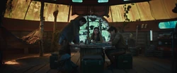 Wilmon visits Cassian and Caleen in their home on Yavin 4.