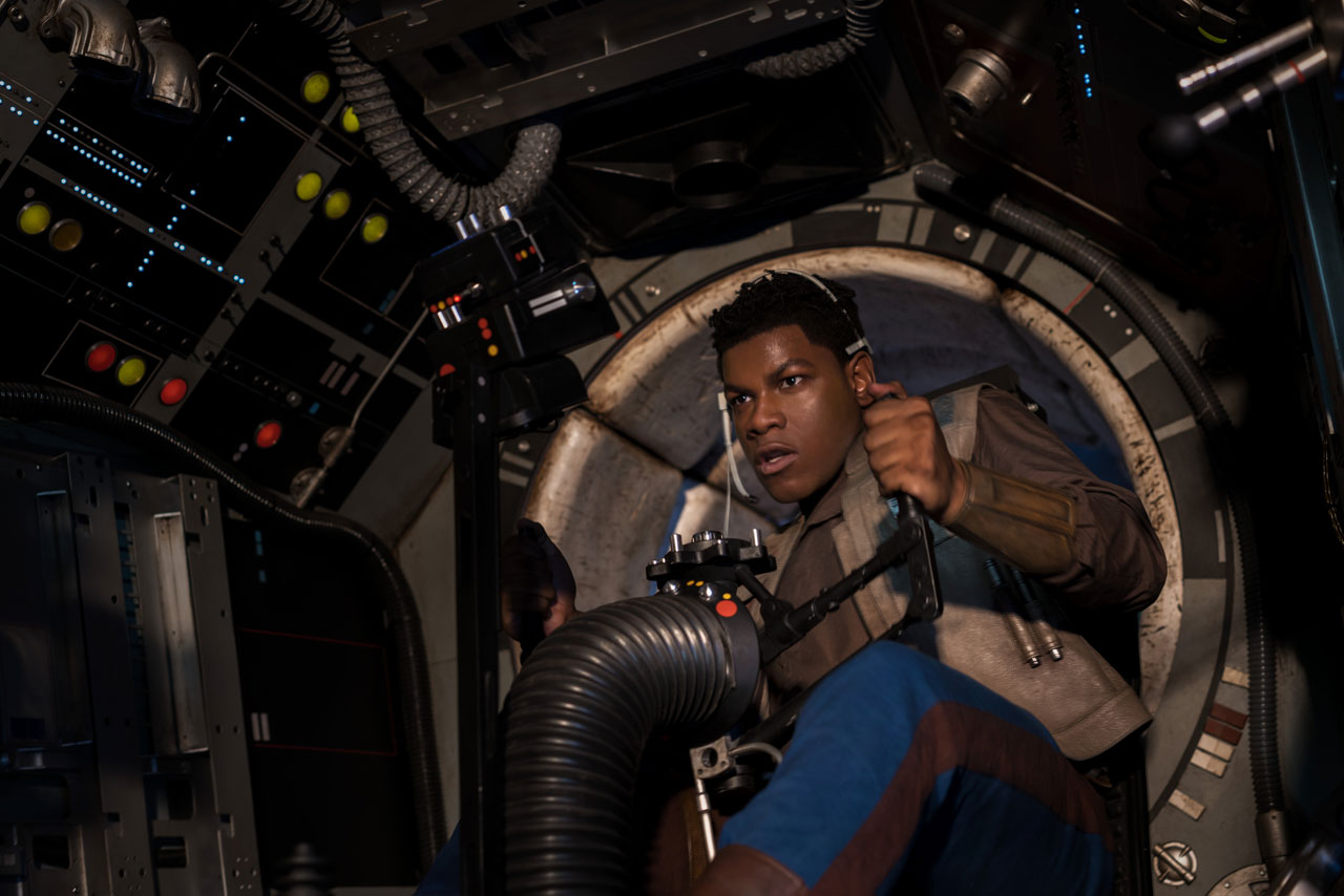 Finn manning one of the Millennium Falcon's cannons.