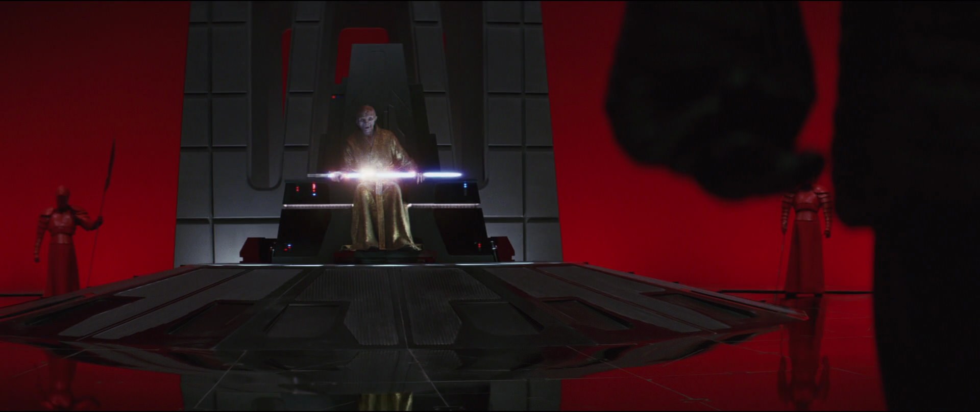 Snoke was killed in the throne room by Kylo Ren, who used his grandfather's lightsaber to cut the Supreme Leader in half.