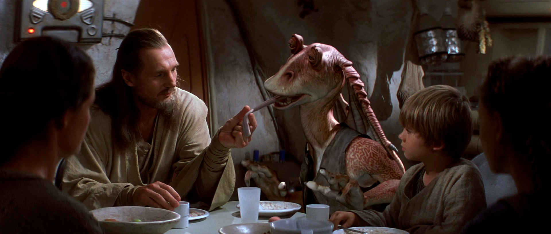 Qui-Gon Jinn uses Force speed to catch Jar Jar Binks' tongue.