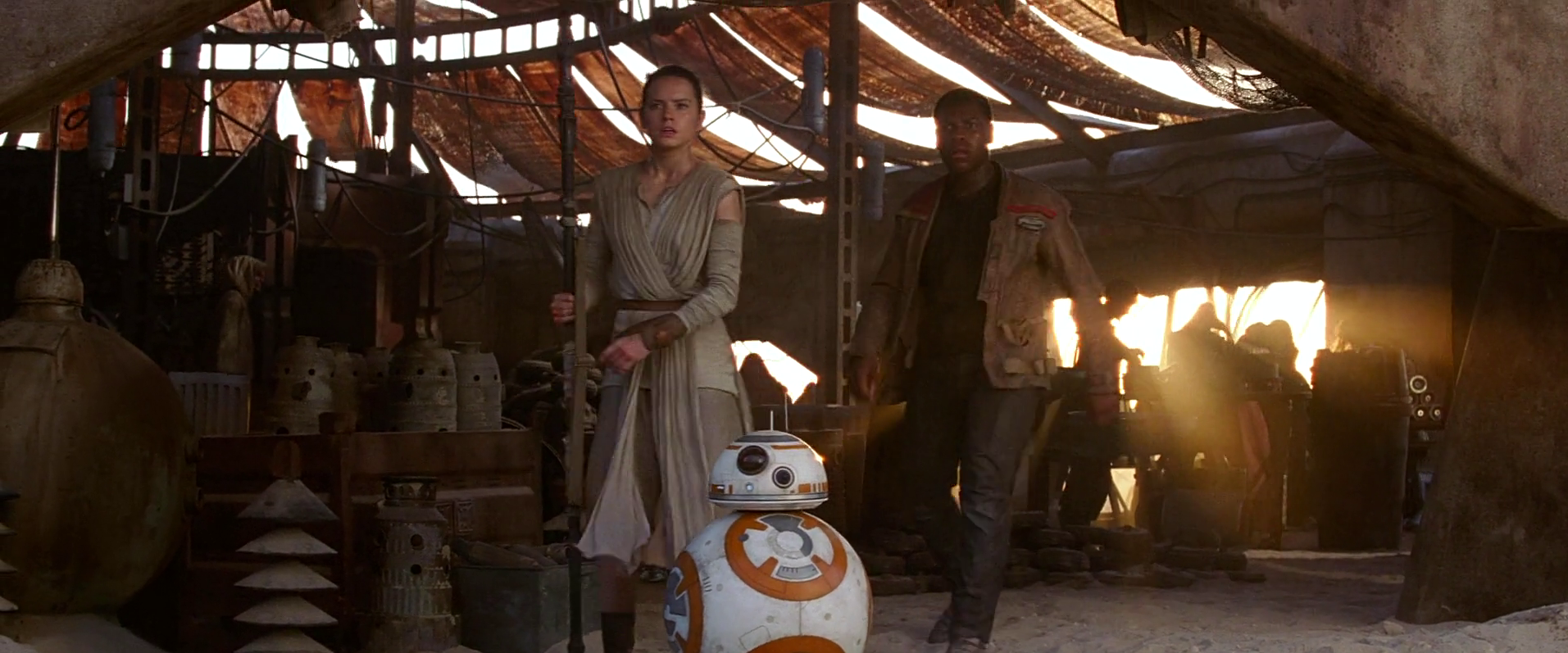 BB-8, Finn, and Rey notice stormtroopers looking for the droid.