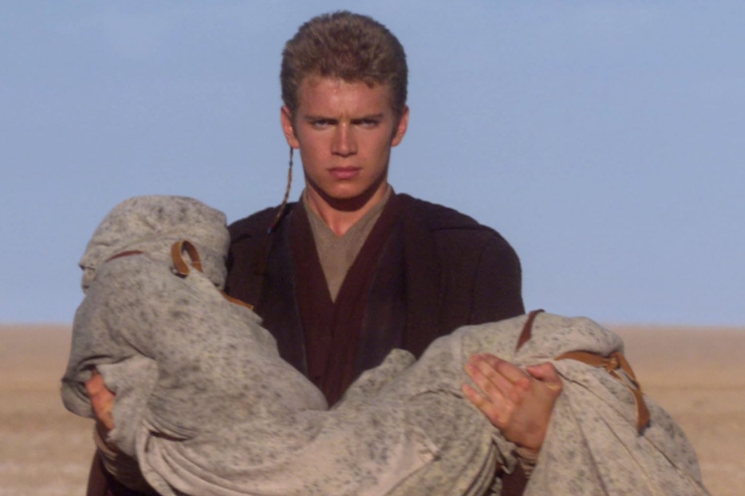 Anakin holding the body of his mother.