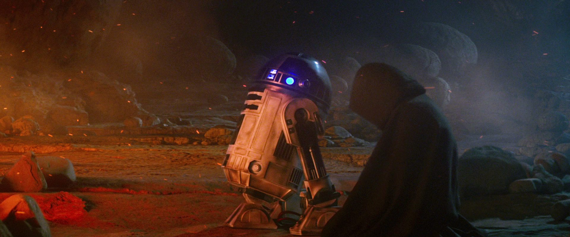 Luke Skywalker and R2-D2 as seen in Rey's Force vision.