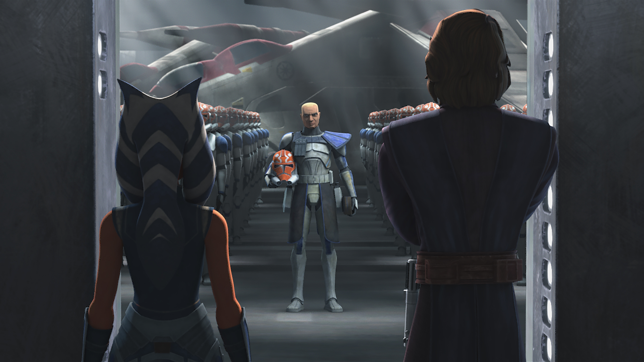 Skywalker presents Tano with the clones and their newly painted helmets.