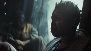 Bayso and Snee sit in the wrecked Breon HOY-39 on Yavin 4. They look concerned.