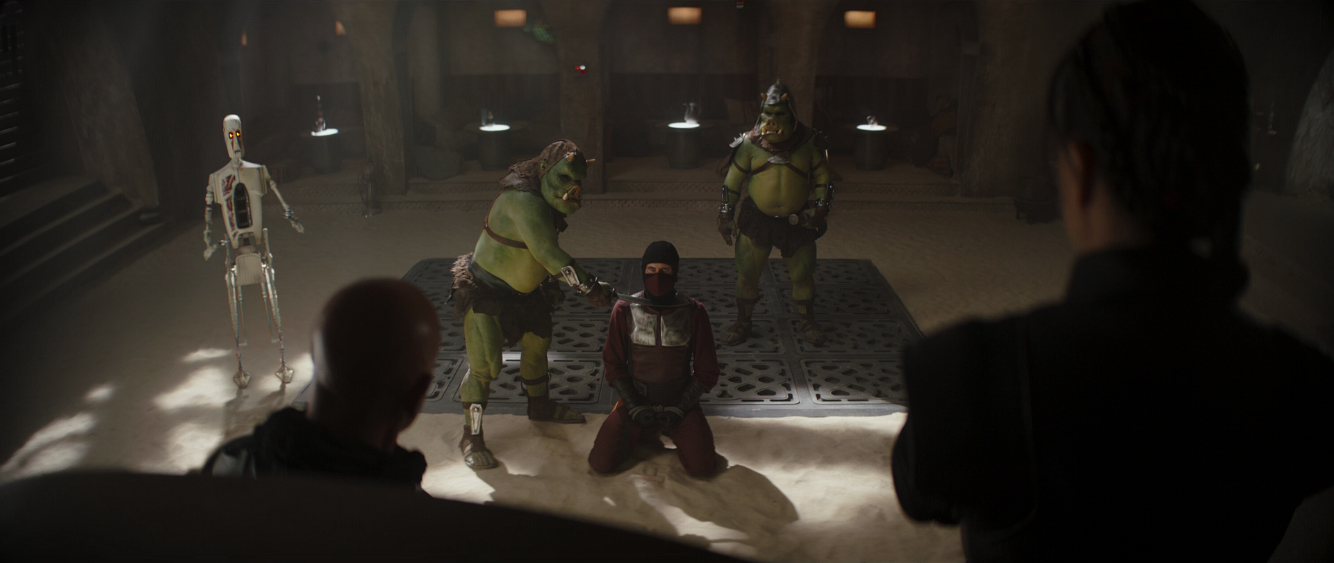 The assassin was captured and brought to Fett's palace.