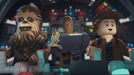 Roger aboard the Millennium Falcon with Solo and Chewbacca