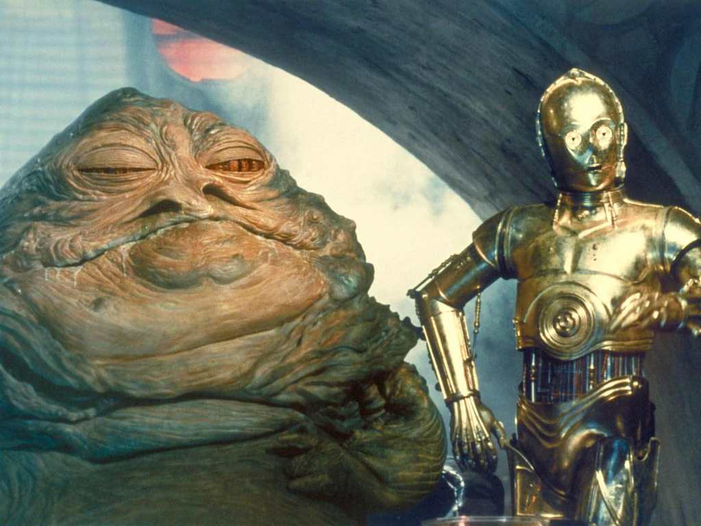 C-3PO is abused by his new master, Jabba the Hutt.