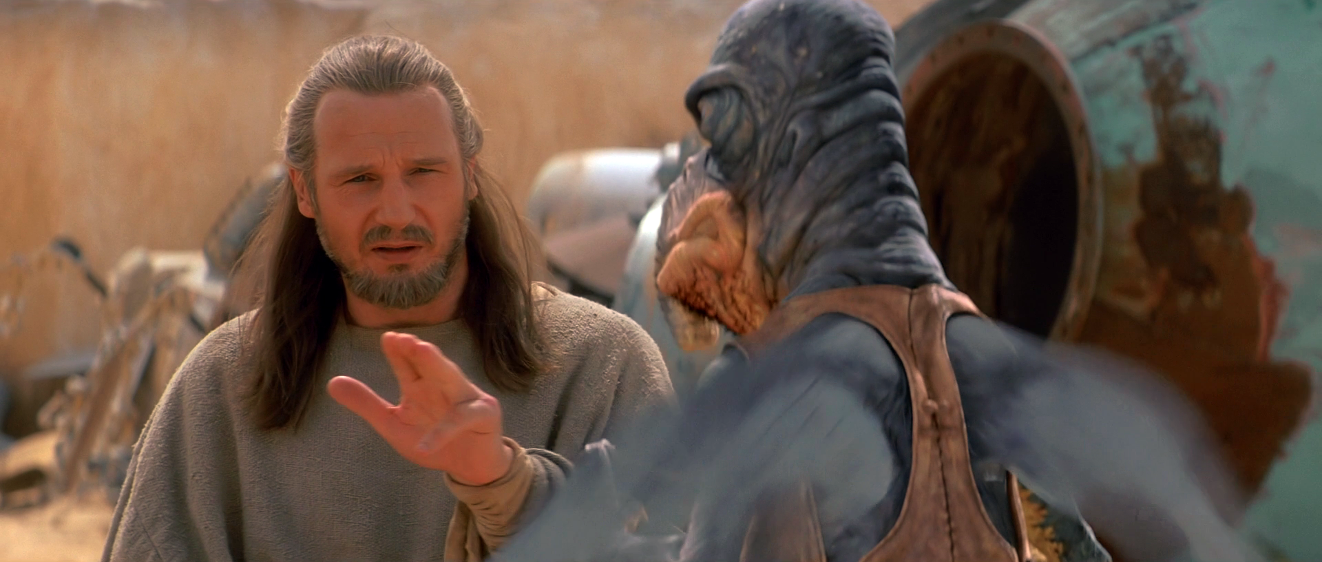 Qui-Gon Jinn attempting to use a mind trick on Watto