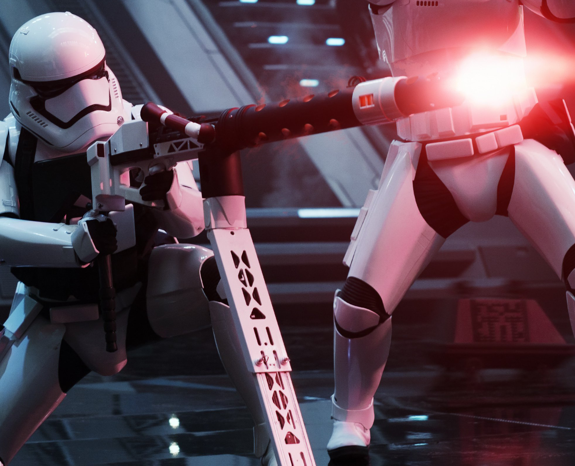 A First Order heavy assault trooper firing a megablaster