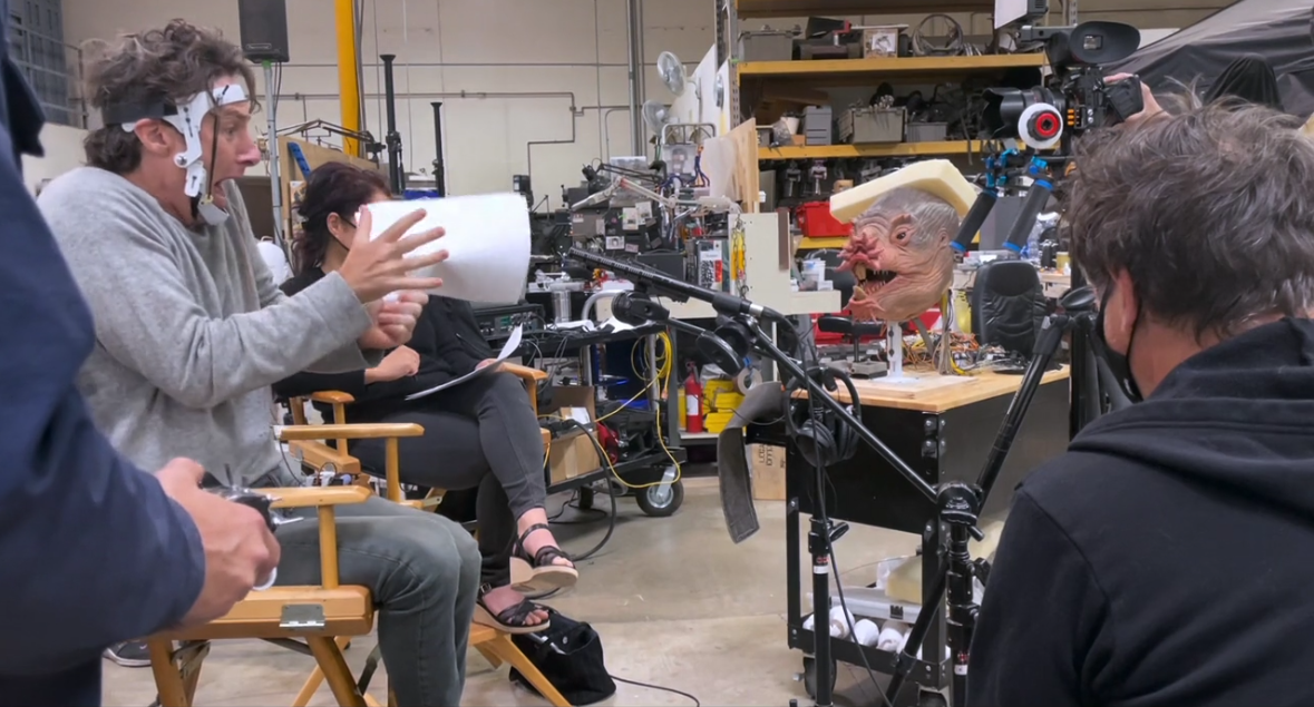 Zach Braff (left) practices lines while connected with Freck's animatronic head.