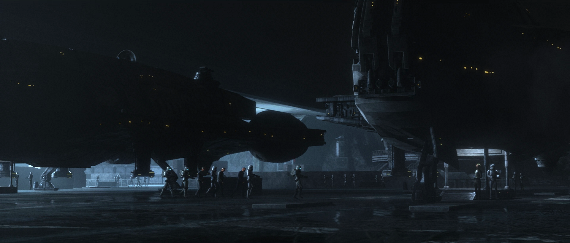 Howzer and his men being escorted through the base's hangar