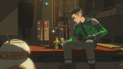 Kazuda unpacks his belongings, including his trophy.