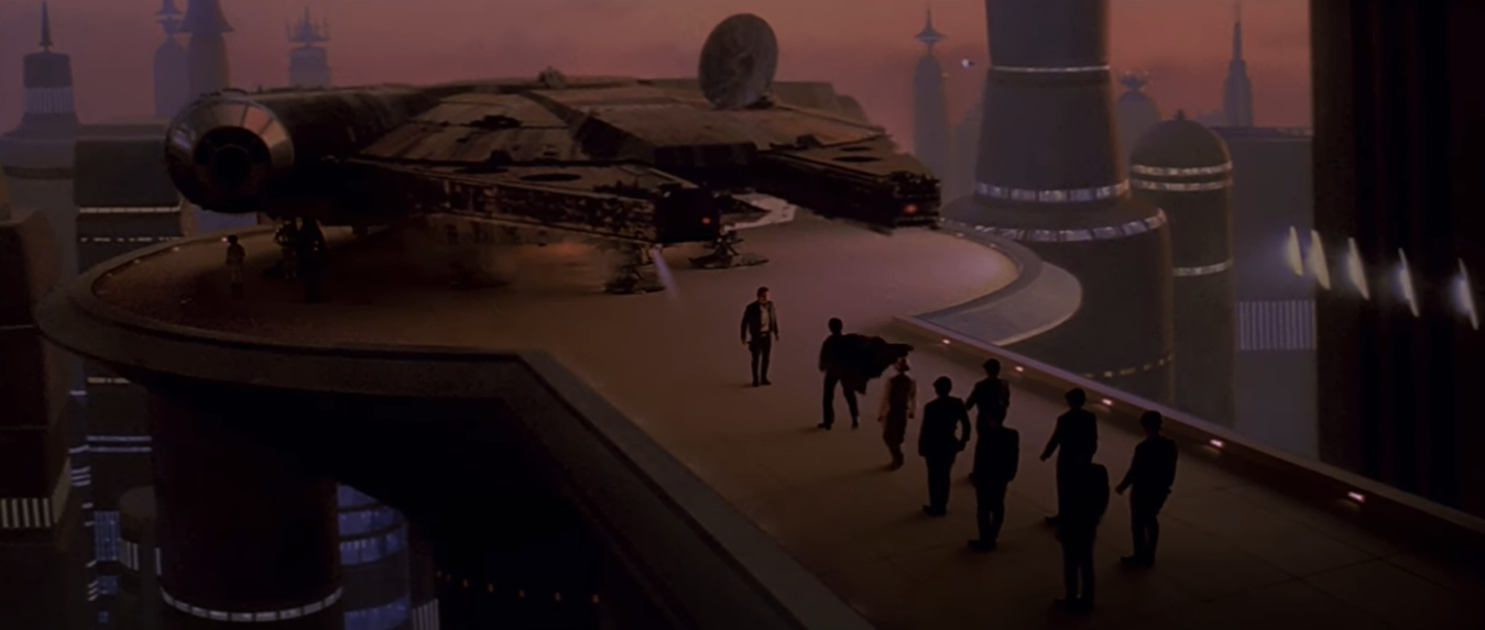 Lando Calrissian and his Bespin Wing Guard escorts greet Han Solo on Platform 327.