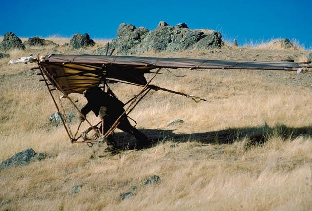 An Ewok prepares his glider.