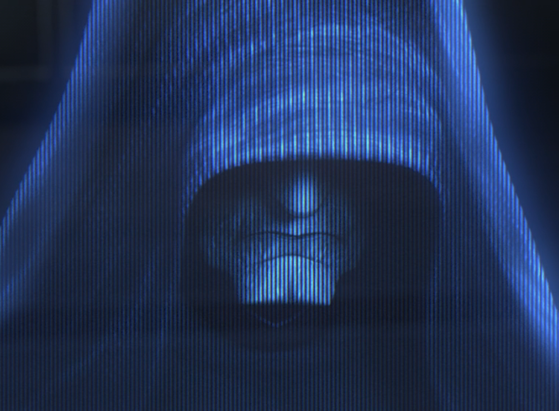 Darth Sidious spoke to Iskat via hologram (a hologram of Sidious pictured) and offered her a new purpose in exchange for her life, which she took despite it meaning abandoning Tualon to be executed by their clone troopers.