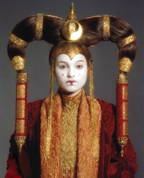 Front-facing and bust-length image of Queen Amidala in red and gold regal attire