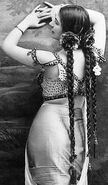 Taken in 1912, illustrating Mata Hari’s costume for the new Indian dance she had created with Inayat Khan.