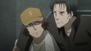 Okabe receiving assistance from Itaru Hashida in 2036.