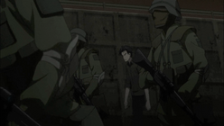 Okabe being led through a warzone