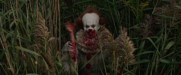 Pennywise devouring the arm of one of its victims