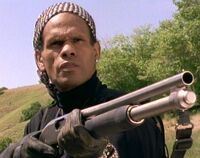 65573.jpg (42 KB) Rat Man (Rick Aviles) and a Mossberg shotgun.