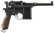 The famous Mauser C/96 'Broomhandle' pistol. This is a more compact variant with a shorter barrel and grips. This compact version is usually referred to as the Mauser 'Bolo'. Supposedly because it was a favorite of the Communists in the Soviet Union in the 1920's and 30.s Bolo is short for Bolshivik.