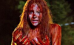 Chloe Moretz as Carrie in the 2013 film