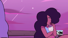 Stevonnie sits on a bench and eats a donut. At the left of the image, Sour Cream is barely visible, and there is a gap between his jacket and the bottom of the frame, where the bench can be seen through the empty space.