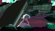 Lapis lifting a large rock.