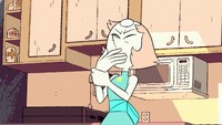 Pearl tries to pull her hand from her mouth.