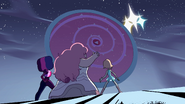 Rose activating her shield to protect Garnet, Pearl, and herself.