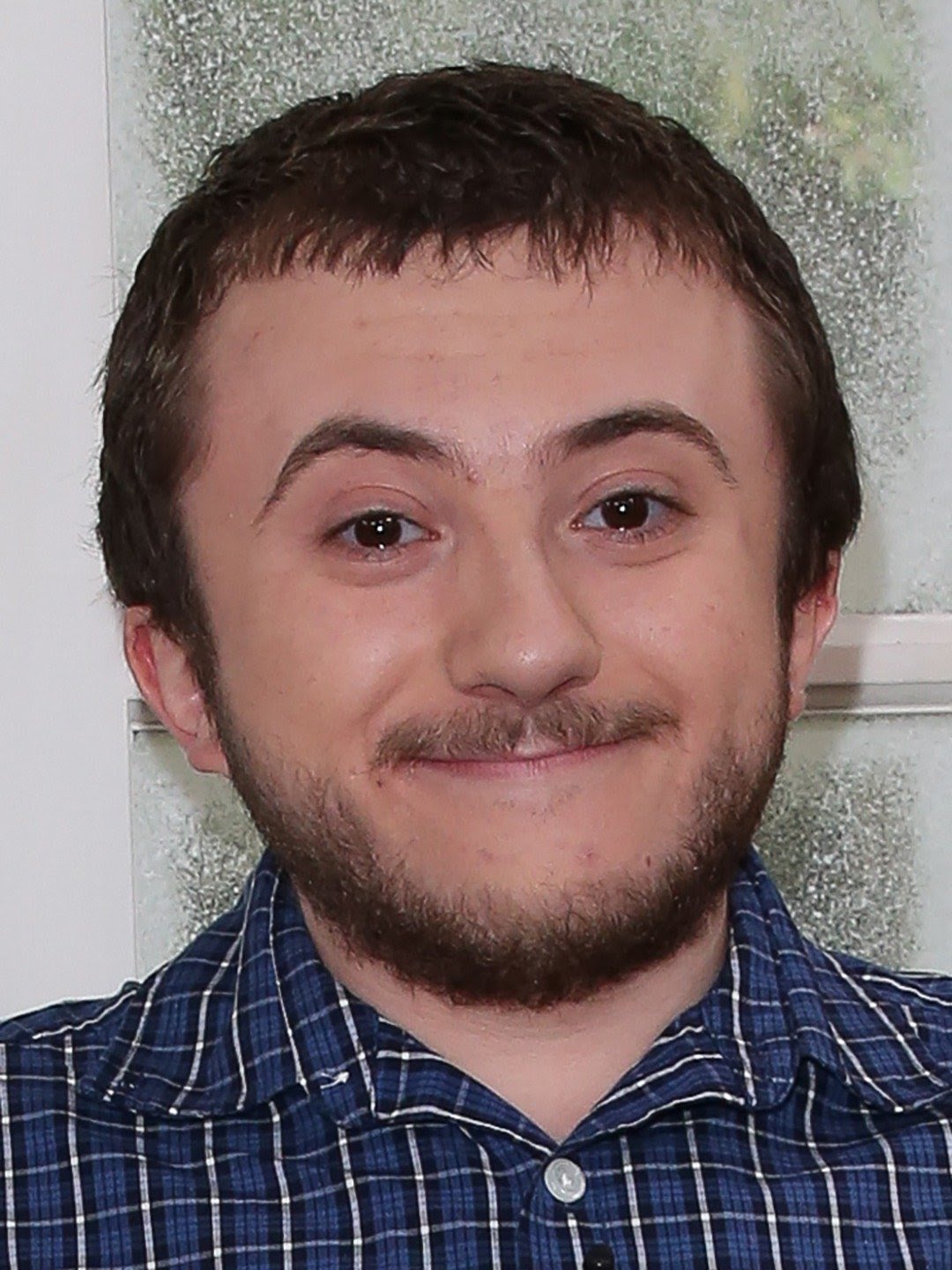 atticus shaffer with his parents