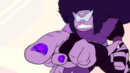 Sugilite with painted nails in close-ups, with her index finger having a painted star.