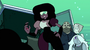 [DESIGN] [02:48] When Garnet talks to Steven after giving him the megaphone, Ruby's gem appears on her right hand instead of Sapphire's.