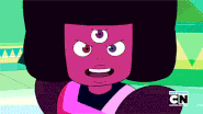 Garnet flashes on her shades.