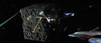 The USS Enterprise-E leads the final assault on the Borg cube.