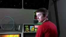 Henry Jones (Christopher Thomson) at the copilot's station on the shuttlecraft Scimitar.