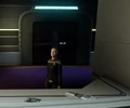 Geschichtsprofessorin Commander Viala in einem runden Gebäude