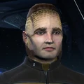 A UFP-Aligned Talaxian Male.